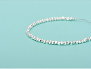 Detailed view of S925 sterling silver irregular triangle beads for DIY jewelry making