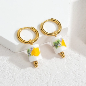 Vintage style 18k gold plated stainless steel hoops with cylindrical porcelain flower charms