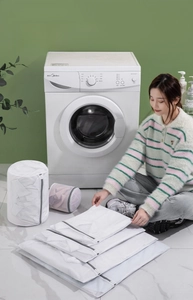 Detail of multi-size mesh laundry bags with durable zippers for washing machine use