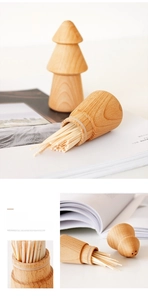 Detail view of the wooden toothpick holder showing the airtight seal ring and wood texture