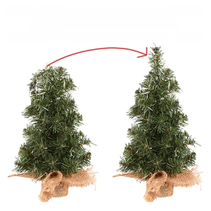 Mini Christmas tree comparison showing folded shipping state and upright display position