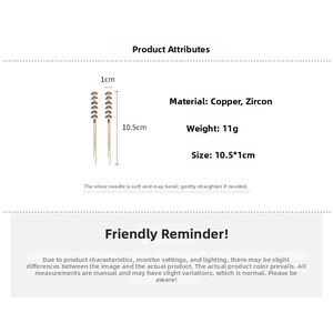 Detailed view of long leaf tassel earrings featuring purple zircon and copper plating