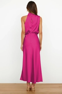Detailed back view of an elegant fuchsia satin halter dress with an open back design