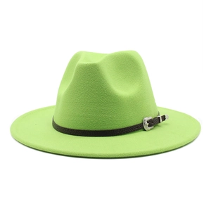 Close-up of vibrant green wool fedora with brown leather band and silver carved buckle