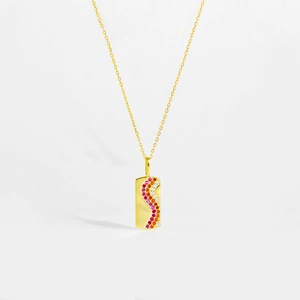 Close-up of golden S925 silver necklace with wave-patterned tricolor rhinestones