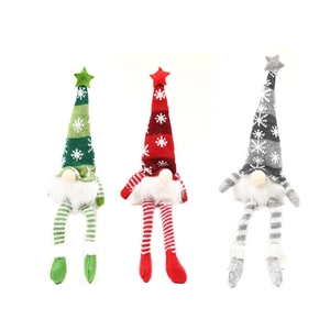 Lighted Christmas gnomes in green, red and grey knit fabric for holiday window decor