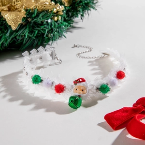Detail of Christmas pet collar with white lace, Santa pendant, and colorful pom-poms