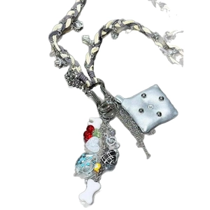 Handmade woven punk long necklace and bag charm with heart and cherry charms