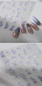 Detailed 3D relief nail stickers featuring purple bows and lily of the valley designs