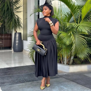 Chic black sleeveless high-neck top and pleated midi skirt two-piece set for women
