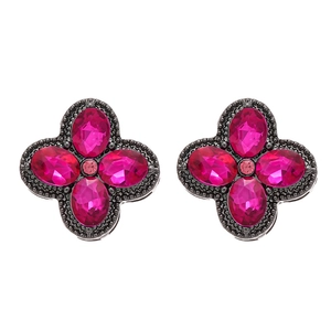 Vintage rhobmus clover stud earrings with deep pink gemstones and antique silver finish