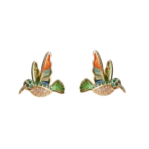 Macro shot of colorful enamel hummingbird stud earrings with inlaid zircon crystals