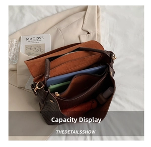 Deep brown crocodile leather tote bag interior showing large capacity for essentials