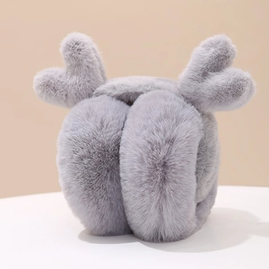 Detailed view of fluffy grey faux fur earmuffs with cute plush reindeer antlers design