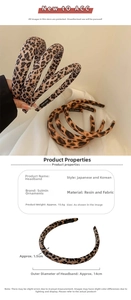 Detail view of leopard print headband showing 1.5cm width and 14cm diameter dimensions