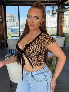 Sexy leopard print crop top with black lace trim and bow tie detail for women