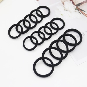 Set of 12 black high-elastic seamless hair ties arranged on a clean white surface