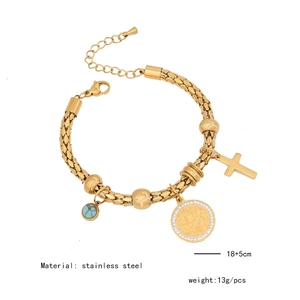 Detail of golden stainless steel bracelet with cross and turquoise charms, 18+5cm size