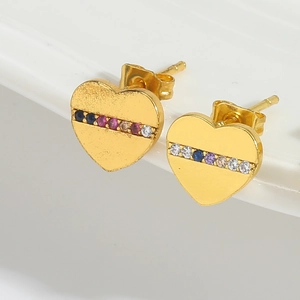 Close-up of gold heart earrings with vibrant multi-color zircon stones on white stand