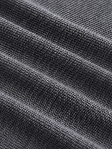 Macro shot of dark grey slim fit T-shirt showing detailed ribbed knit cotton texture