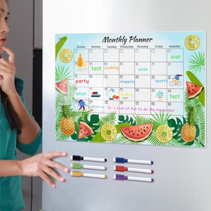 Magnetic acrylic weekly calendar set on fridge with colorful markers and fruit designs