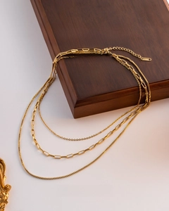 Detail of 18K gold-plated triple-layered stainless steel necklace with vacuum plating