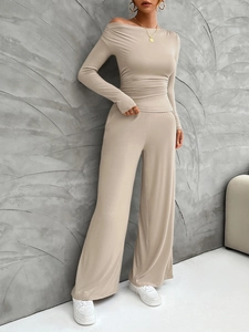 Beige two-piece set featuring off-shoulder long sleeve top and wide-leg trousers fashion