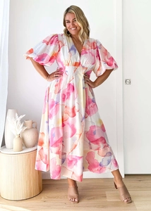 Detailed view of floral watercolor print and puff sleeves on a V-neck A-line midi dress