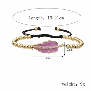 Adjustable black rope bracelet featuring a purple leaf pendant and gold beads with dimensions