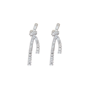 Elegant silver bow knot tassel earrings with sparkling zircon stones on a white background