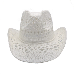 Detailed view of hollow knit patterns on an off-white straw western cowboy sun hat