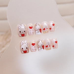 Cat eye press-on nails with rabbit, heart patterns, and pink glitter for Valentine gift