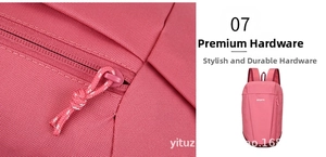 Detailed view of high-quality zipper hardware on a pink outdoor sports backpack