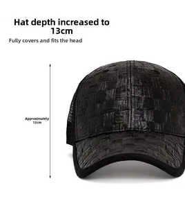 Detailed view of black woven baseball cap with 13cm deep crown and breathable mesh