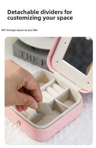 Pink jewelry box with removable dividers and an internal mirror for DIY storage space