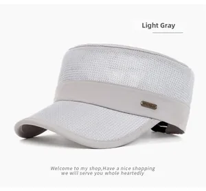 Detail of light gray cadet hat featuring breathable mesh fabric and metal logo plaque