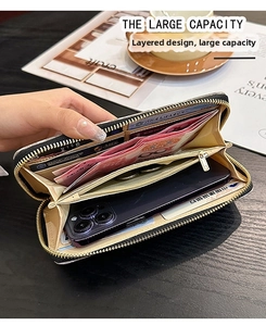 Detailed interior of women's long wallet with large capacity slots and smartphone storage