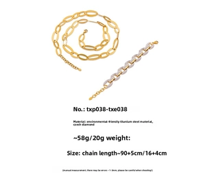 Macro view of gold titanium steel jewelry set with dimensions and crystal details