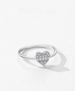 Detailed macro shot of a S925 sterling silver heart ring with pavé-set zircons