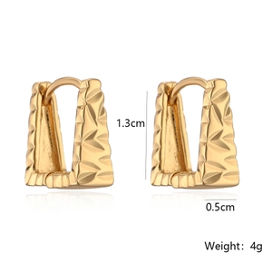 Detail view of gold-plated geometric U-shaped hoop earrings with hammered texture