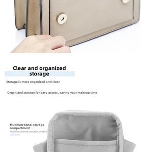 Macro detail of beige leather cosmetic bag showing magnetic clasp and grey inner lining