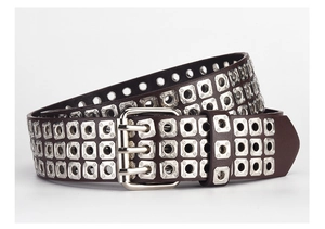Detail of dark brown punk PU leather belt with triple-prong buckle and metal rivets