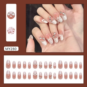 Pink jelly French press-on nails with 3D bows, pearls and crystals in 24 piece set