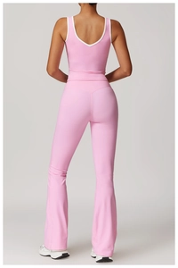 Rear view of pink yoga set showing backless sports vest and flared leggings for women