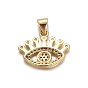 Detail of gold-plated evil eye pendant featuring crown design and black zircon pupils