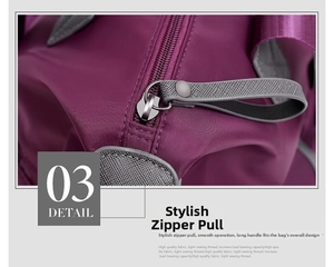 Detail view of smooth zipper pull and purple waterproof oxford fabric on travel bag