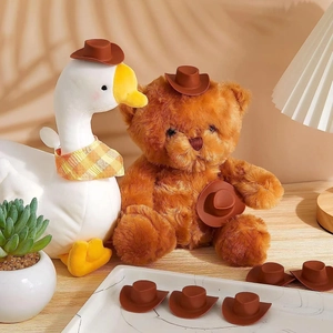 Miniature brown western cowboy hats used for plush dolls and teddy bear party decorations