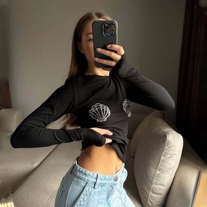 Slim fit black long sleeve t-shirt for women with sparkling shell rhinestone patterns