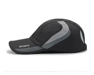 Close-up of black mesh sports cap with breathable grey panels and SPORTS text logo