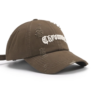Distressed dark brown baseball cap featuring 3D white gothic embroidery and torn details
